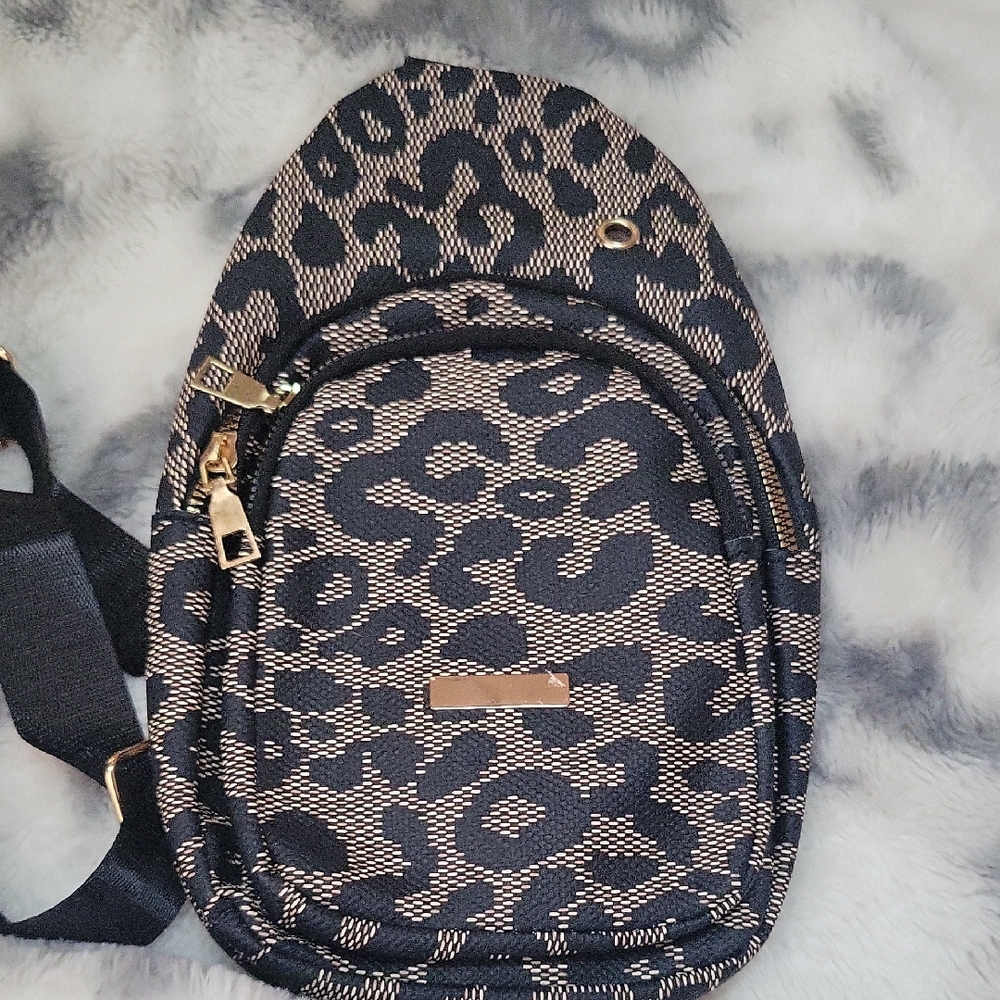 Source Unknown Black and Tan Leopard Backpack